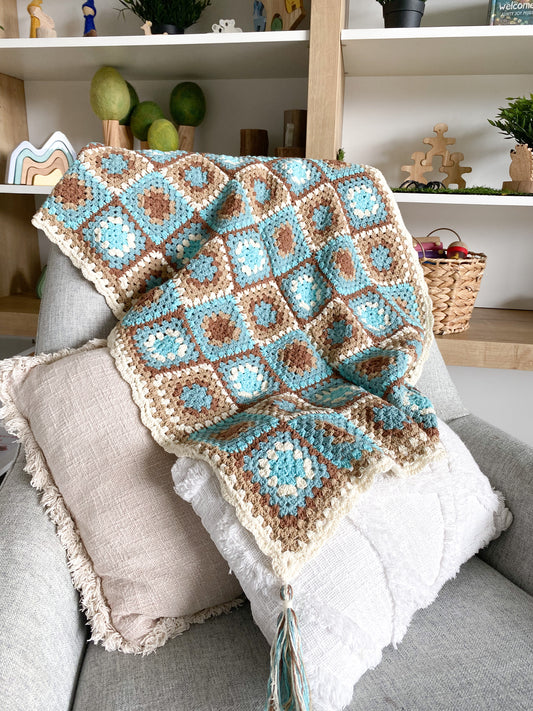 Ocean crochet baby blanket with tassels